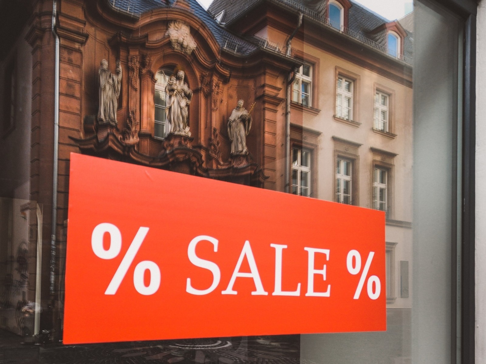 housing sale sign displaying on business