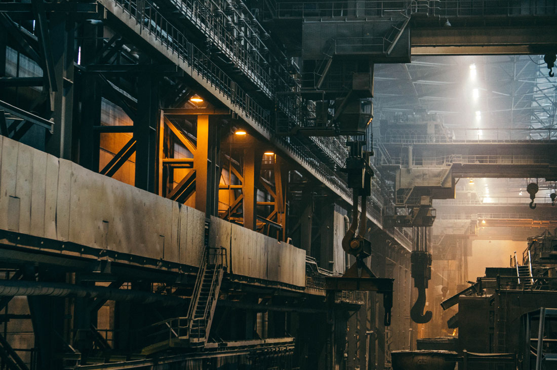 steel machines in big industry warehouse